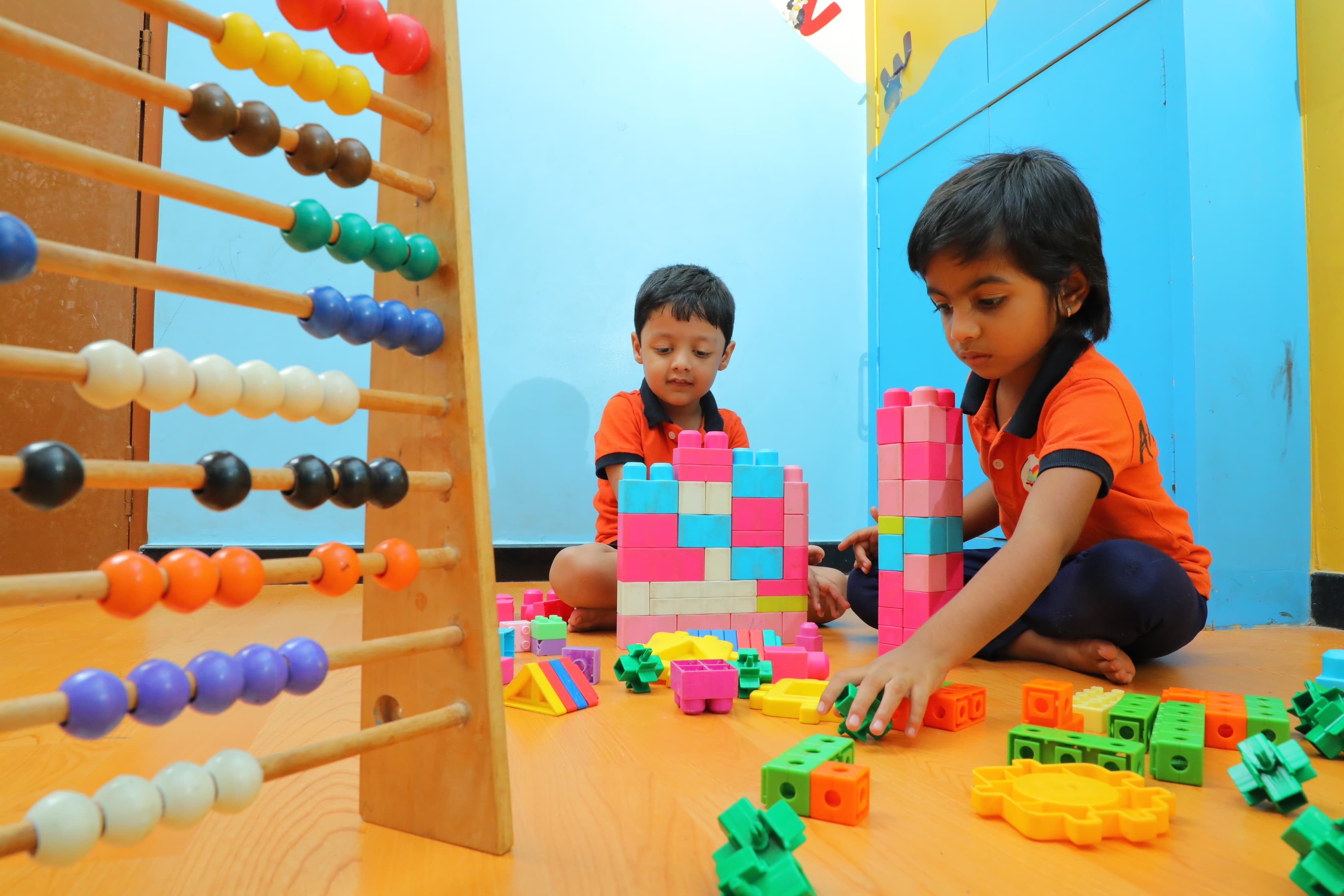 Preschool kids engaged in early learning at Akshram Play School Namakkal
